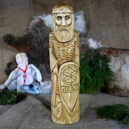 Front view of Perun Slavic God wooden statue 25 cm hand carved from linden wood