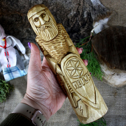 Perun Slavic God wooden statue held in hand for size comparison