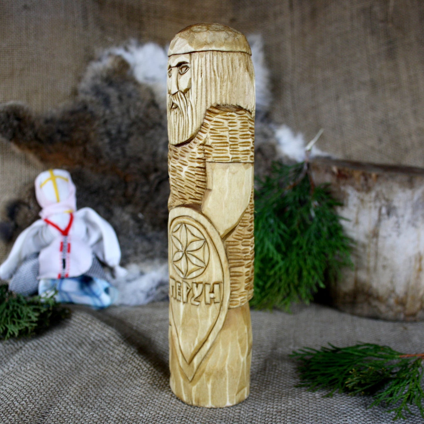 Left side of Perun Slavic God wooden statue handcrafted from linden wood