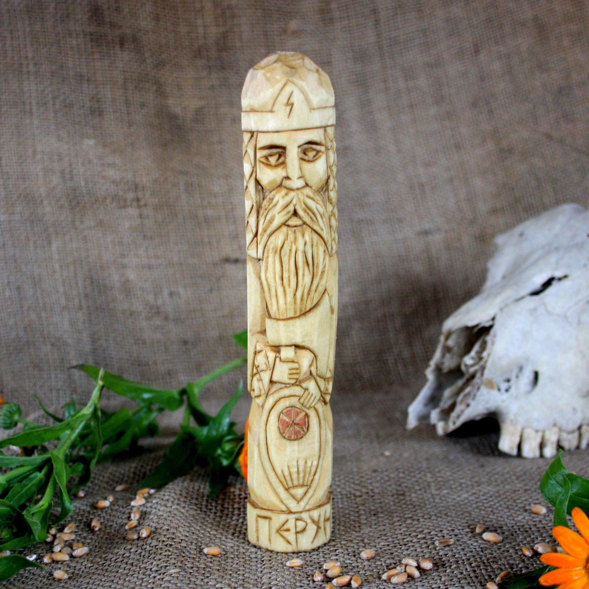 Front view of Perun Slavic wooden idol 18 cm hand carved from linden wood