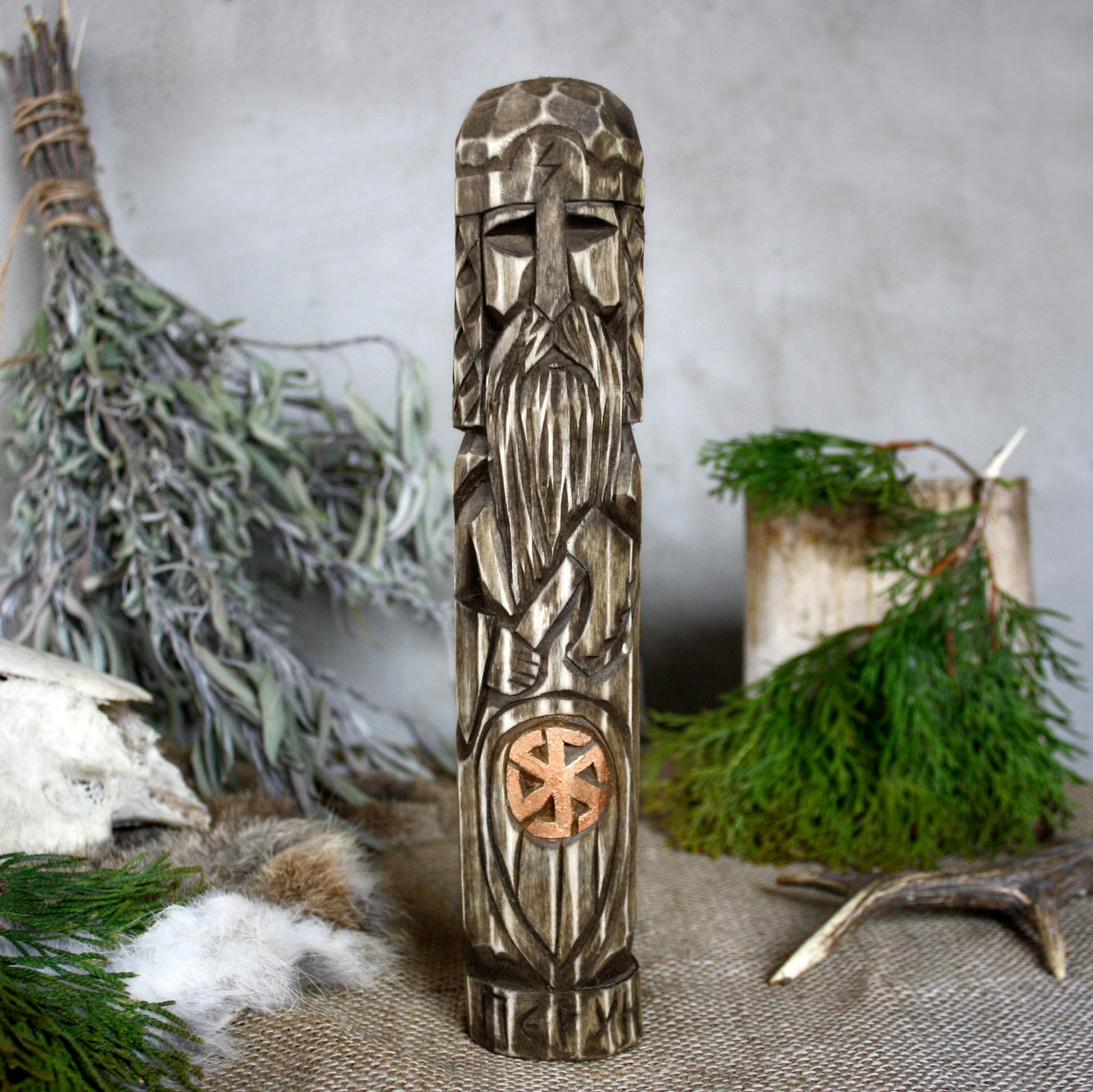 Front view of Perun Slavic wooden idol 25 cm with dark wood finish