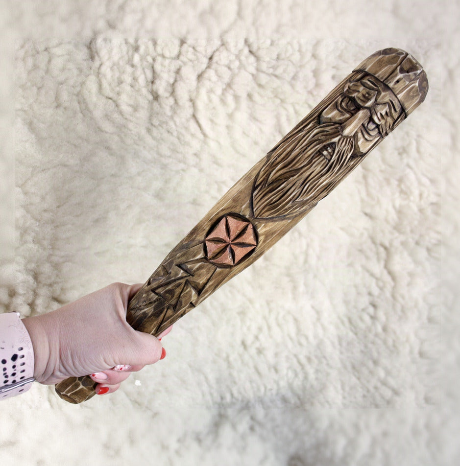 Handmade Perun wooden staff shown in hand for size comparison