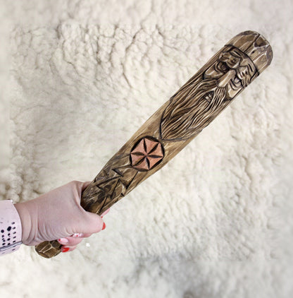 Handmade Perun wooden staff shown in hand for size comparison