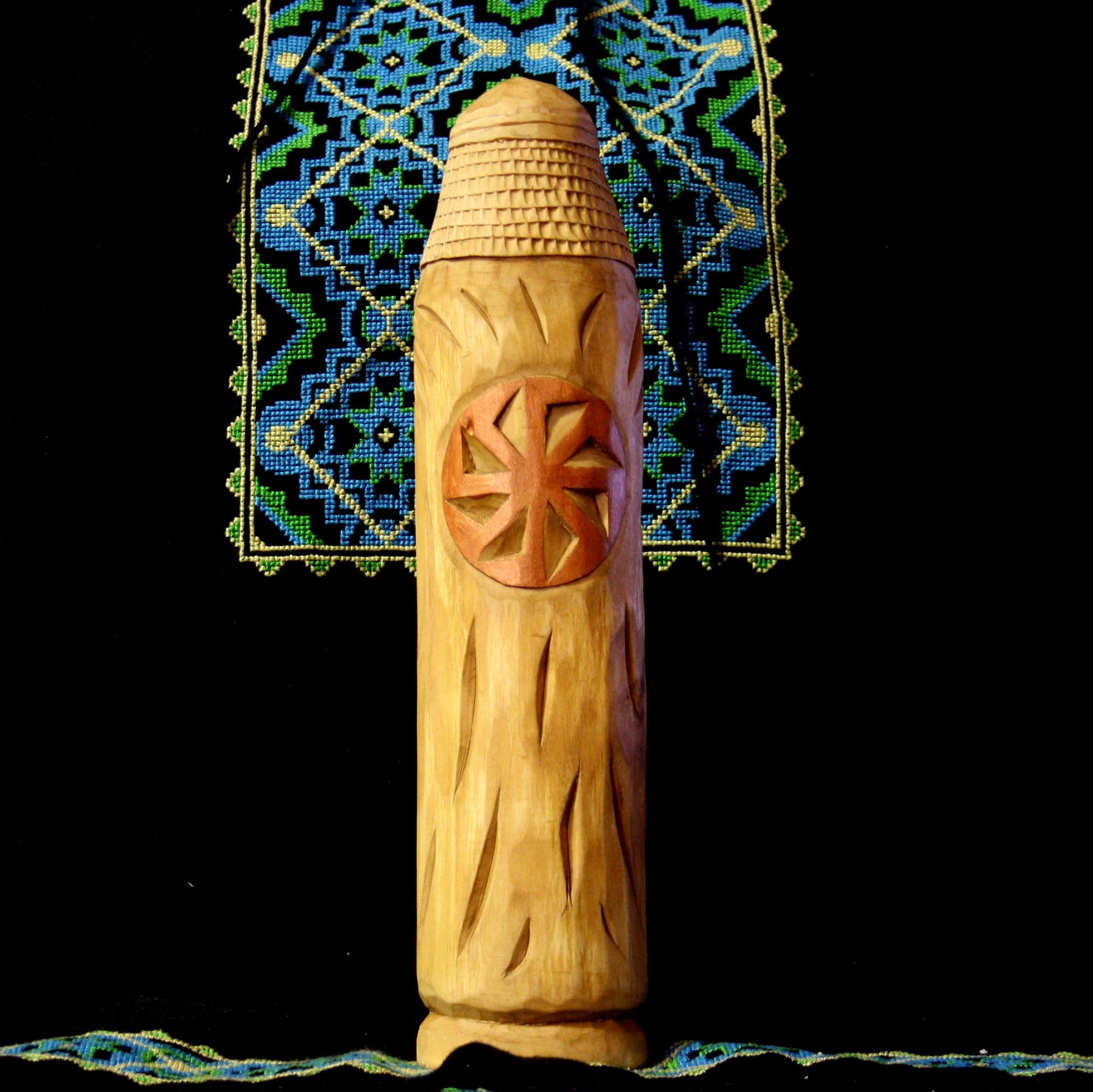 Back view of Perun warrior wooden statue 28.5 cm