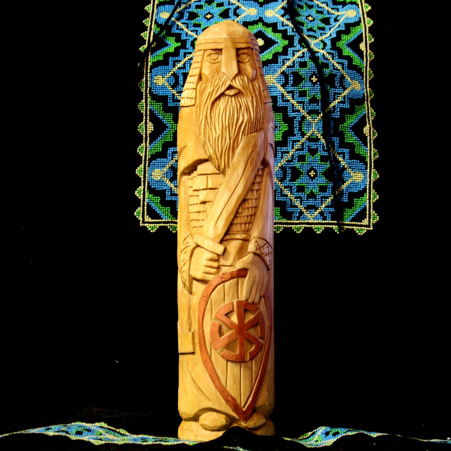 Front view of Perun warrior wooden statue 28.5 cm hand carved from linden wood