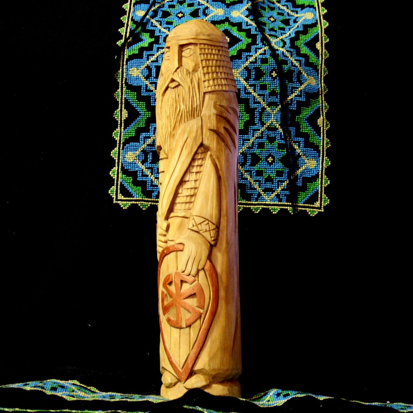 Left side of Perun warrior Slavic God wooden statue