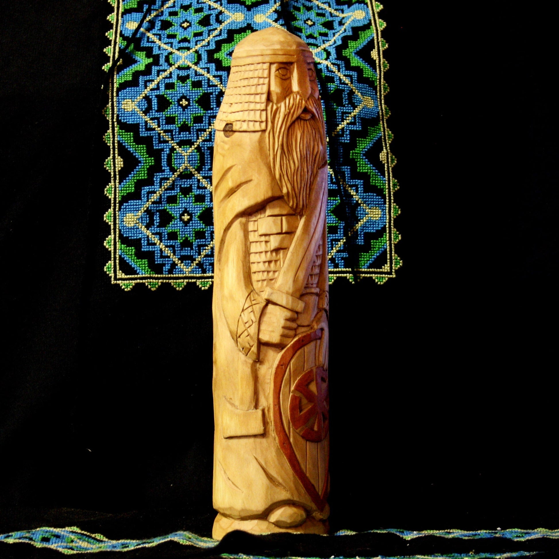 Right side of Perun warrior hand carved wooden statue