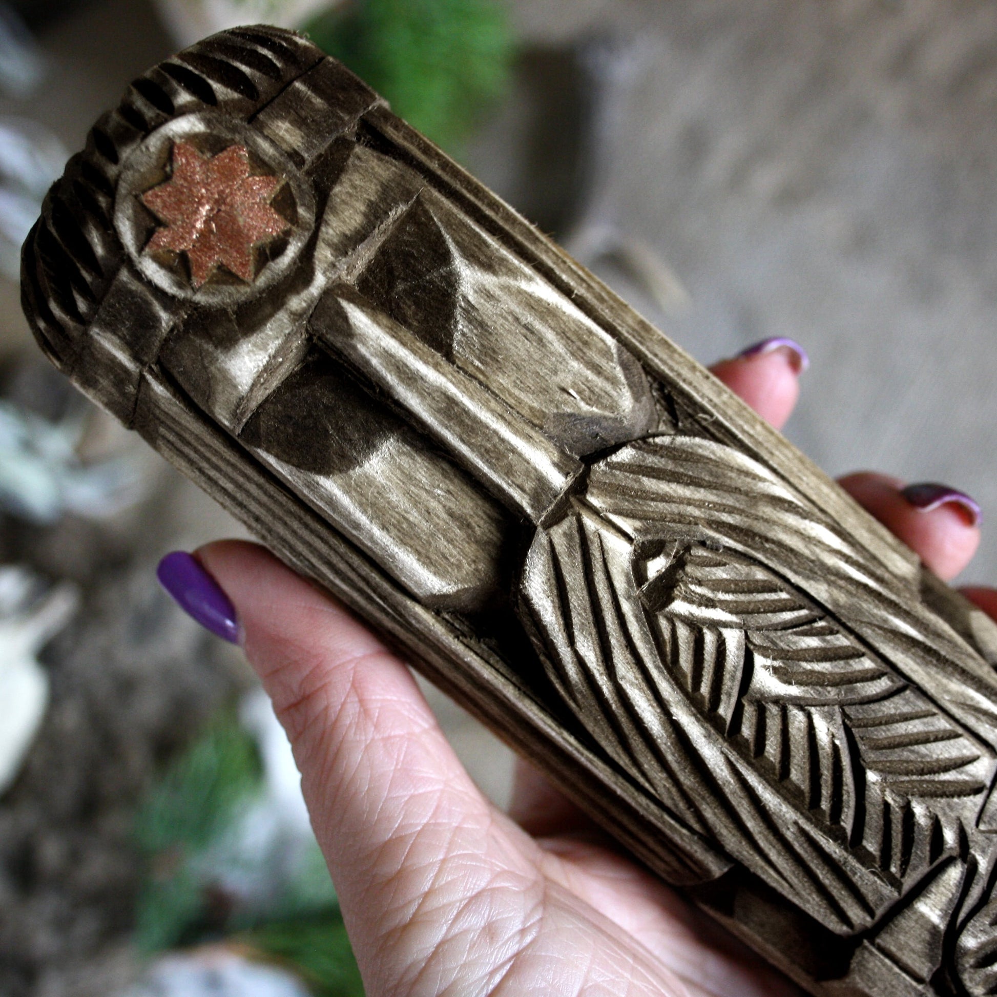Close-up of Rod Slavic god of creation wooden idol 30 cm showing hand-carved facial details