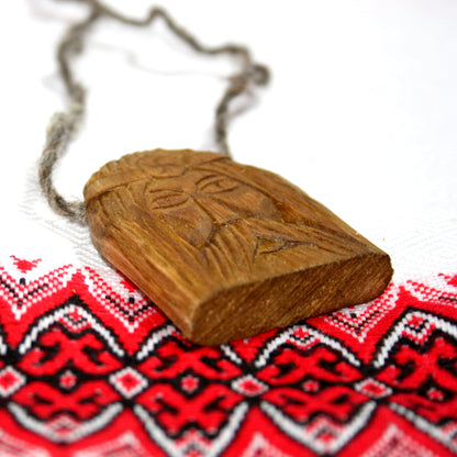 Side view of handmade Rod wooden pendant