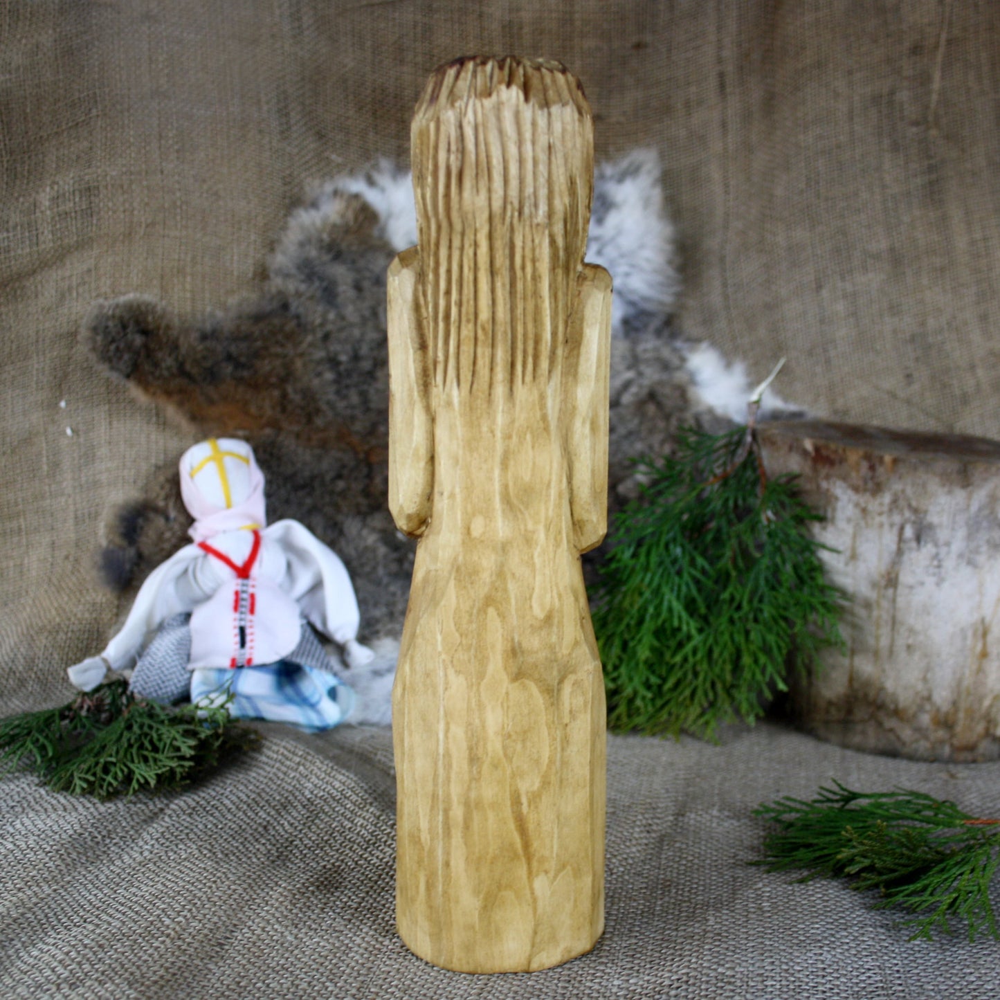 Back view of Rod Slavic God wooden statue handmade wooden pagan sculpture
