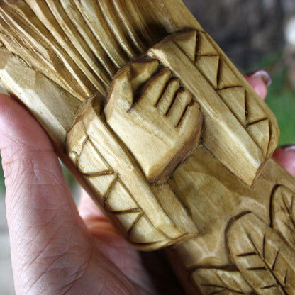 Detailed carving of Rod Slavic God wooden statue handcrafted sculpture