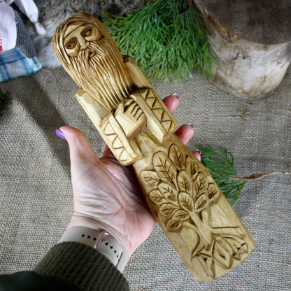 od Slavic God wooden statue held in hand for size comparison 30 cm