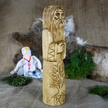 Side view of Rod Slavic God wooden statue 30 cm handcrafted sculpture