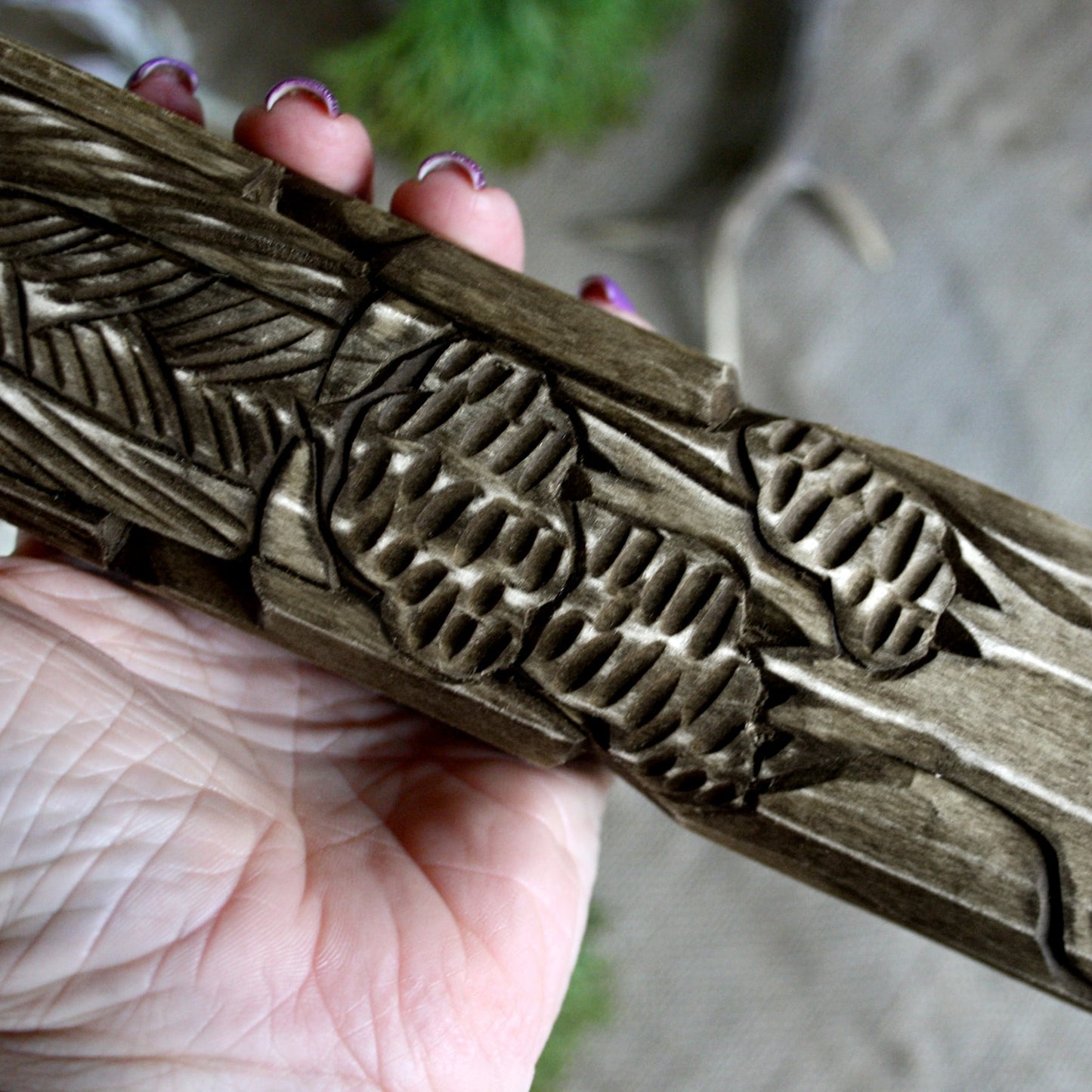 Detailed view of Rod Slavic wooden idol 30 cm showing traditional hand-carved ornaments