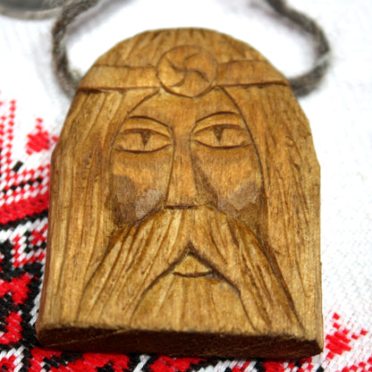 Front view of handmade Rod wooden pendant