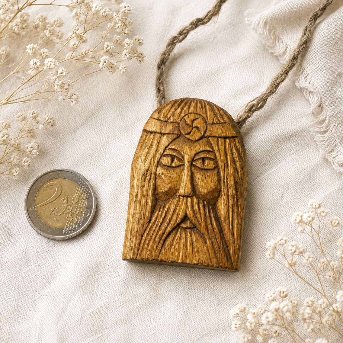 Hand carved wooden pendant of Rod Slavic god made from natural linden wood