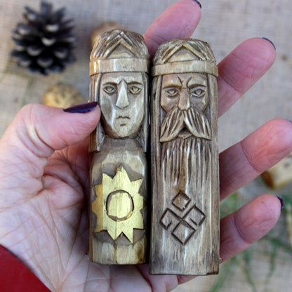 Small Slavic wooden idol 10 cm held in hand to show size and scale