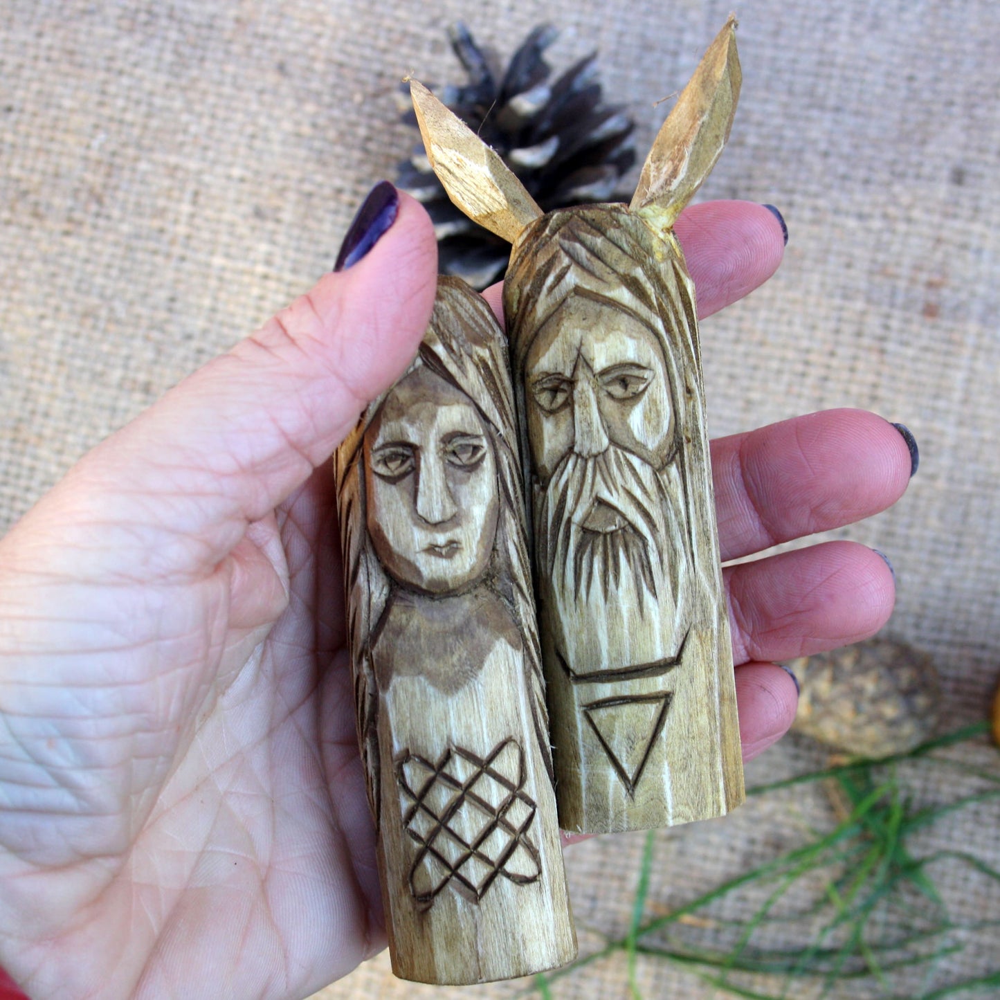 Small 10 cm Slavic wooden idol held in hand to show size and scale
