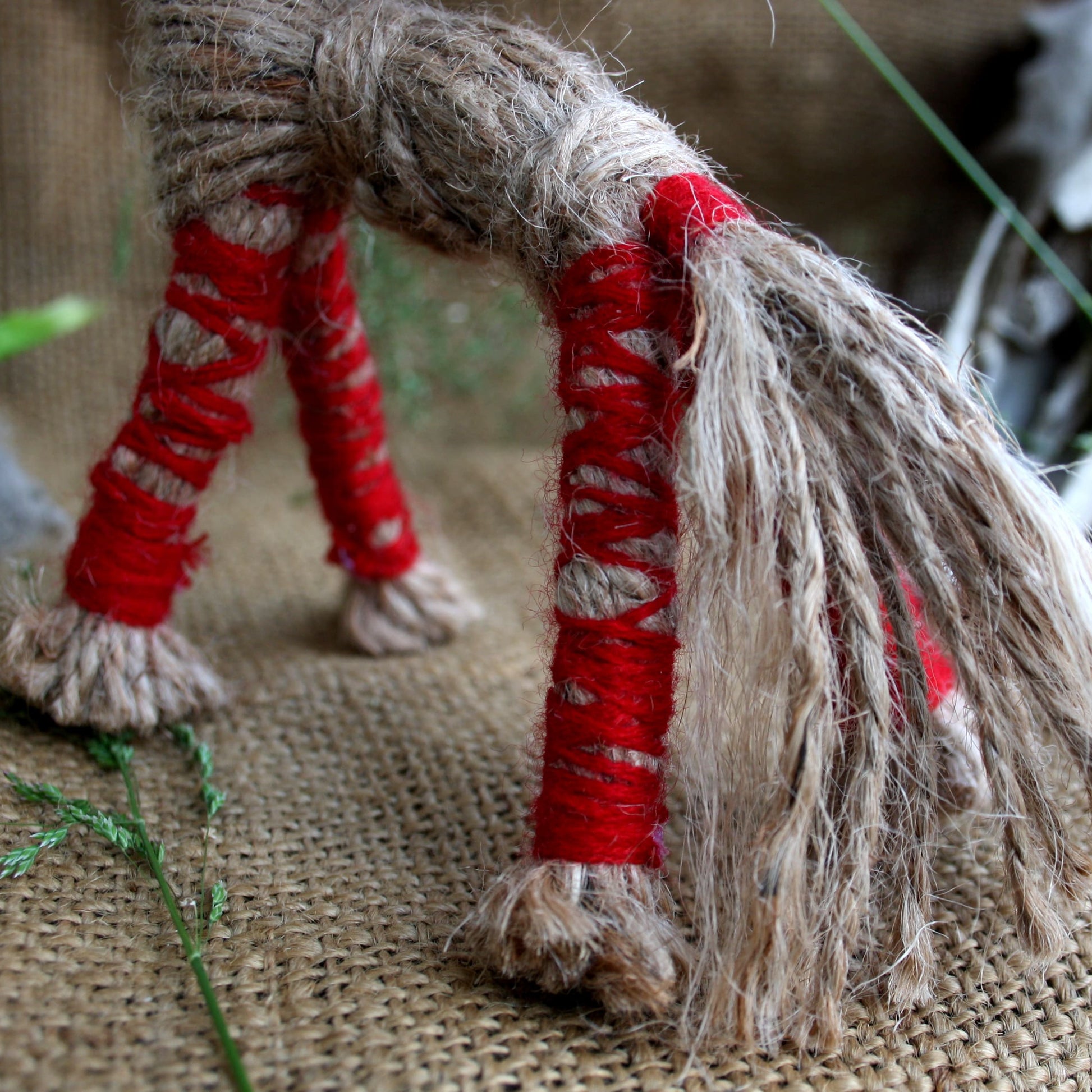 Close-up of traditional thread weaving on Sunny Horse ornament