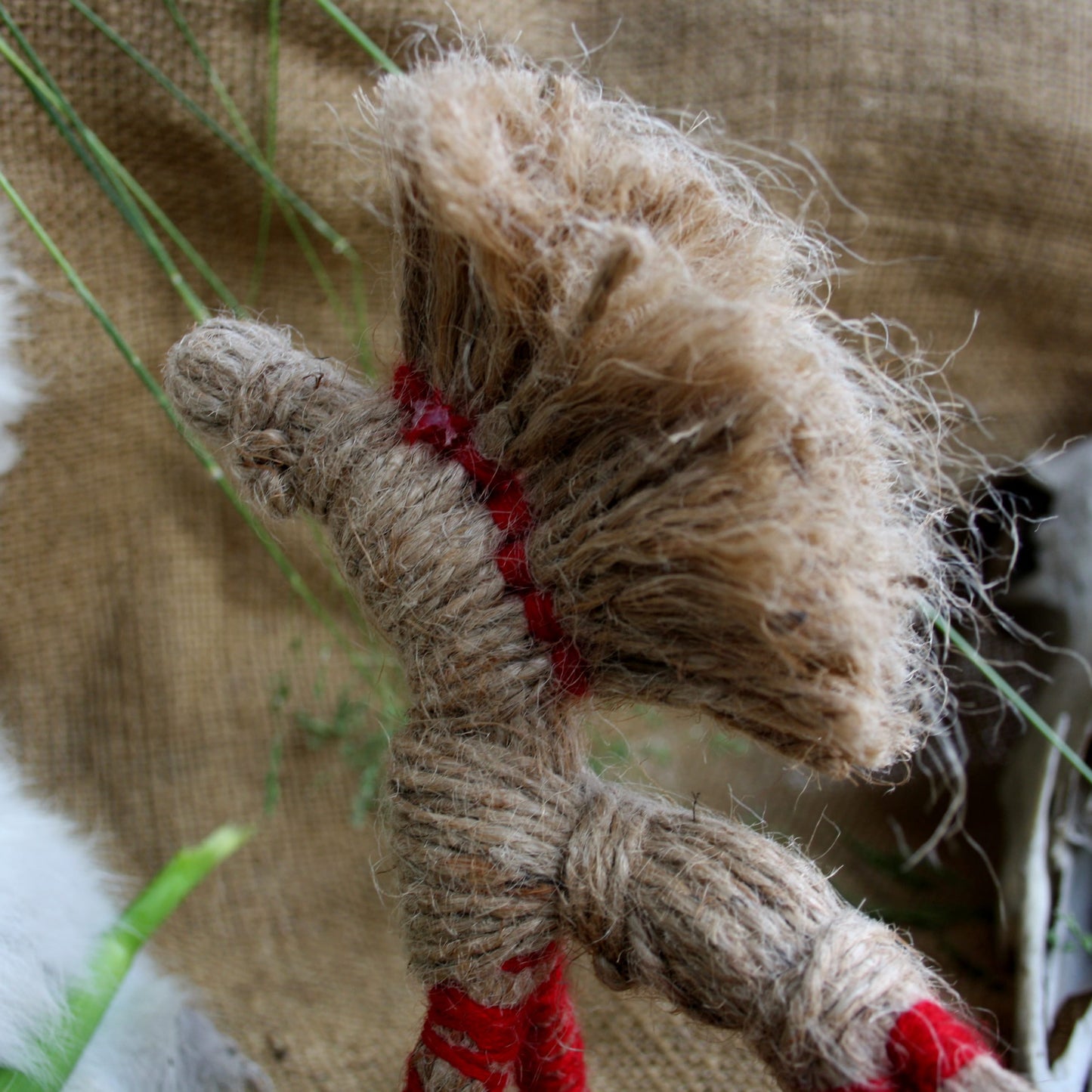 Top detail of handmade Sunny Horse thread ornament