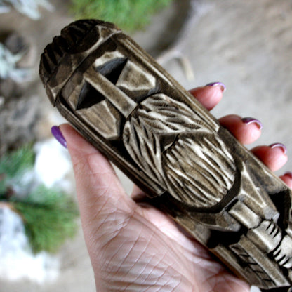 Close-up of Svarog Slavic god of fire wooden idol 25 cm showing hand-carved facial details