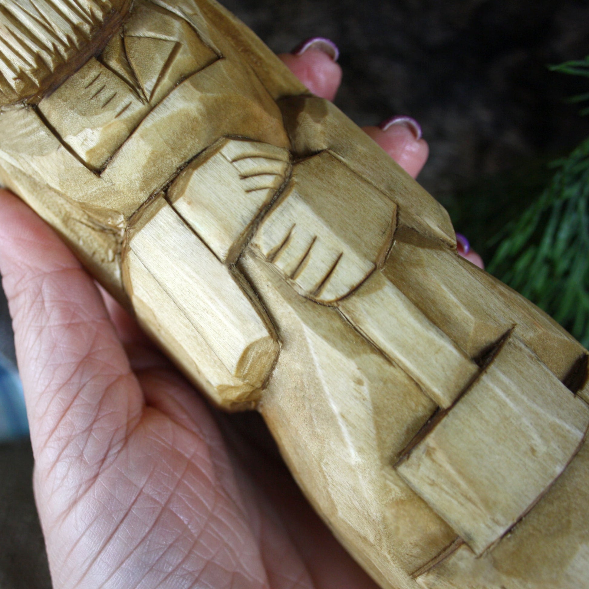 Detailed carving of Svarog Slavic God wooden statue