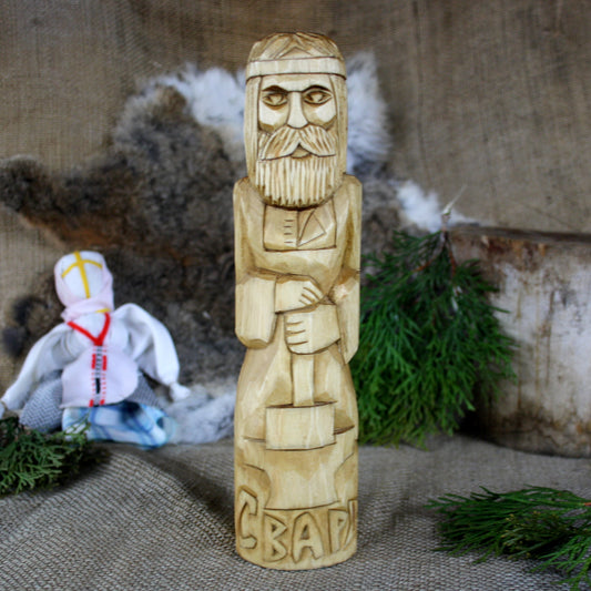 Front view of Svarog Slavic God wooden statue 25 cm hand carved from linden wood