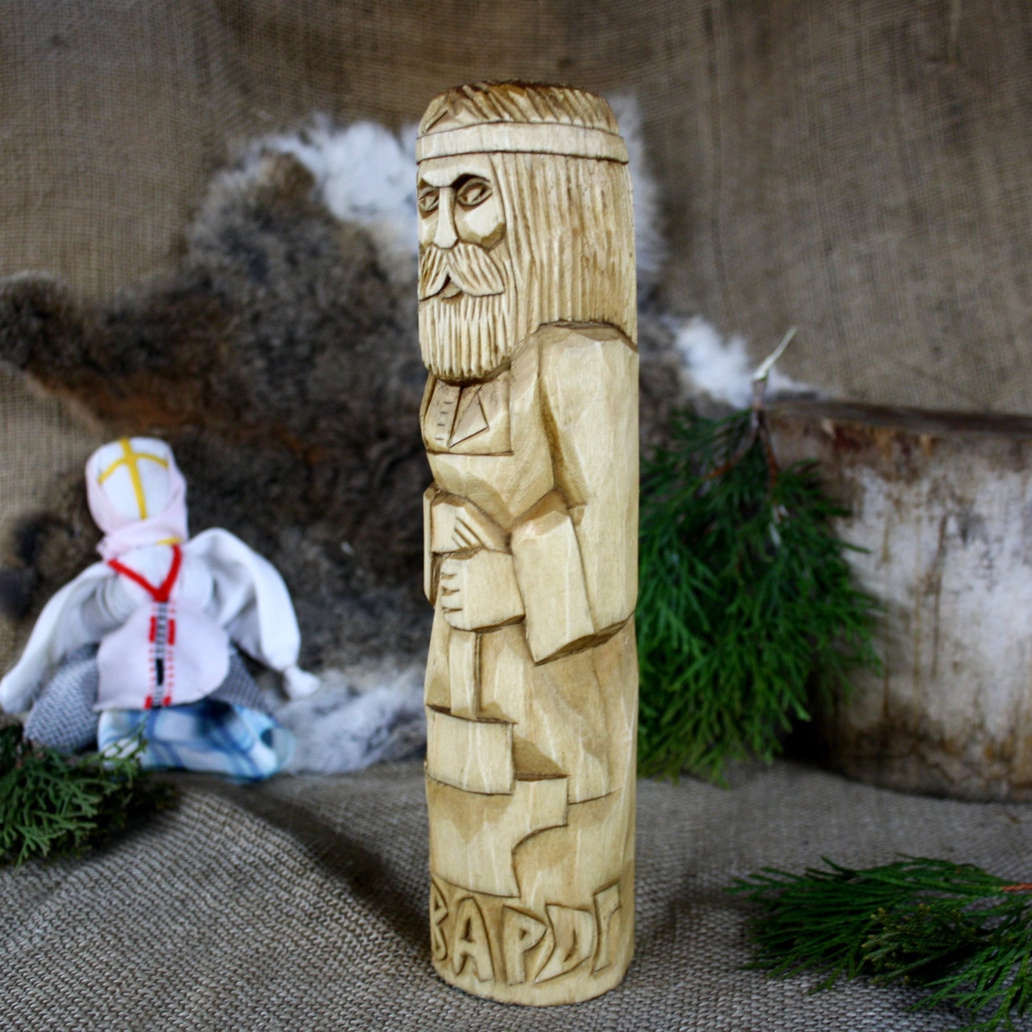 Left side of Svarog Slavic God wooden statue handcrafted from linden wood