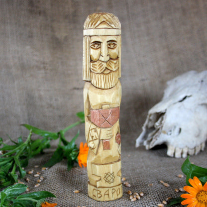 Front view of Svarog Slavic wooden idol 18 cm hand carved from linden wood