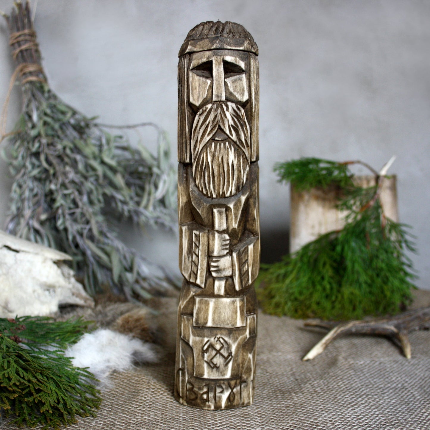 Front view of Svarog Slavic wooden idol 25 cm with dark wood finish