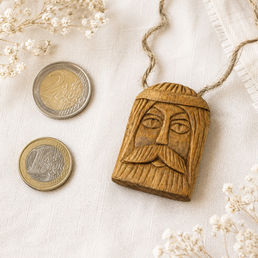 Hand carved wooden pendant of Svarog Slavic god made from natural linden wood