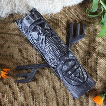 Veles dark Slavic wooden idol 20 cm with removable wooden horns on the table