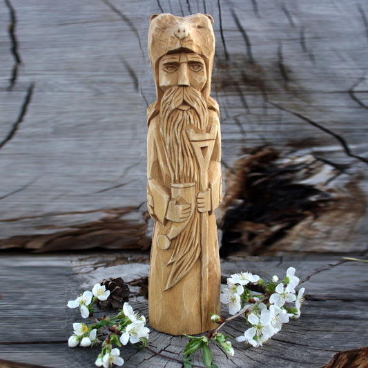 Front view of Veles Slavic God wooden statue 26 cm hand carved from linden wood