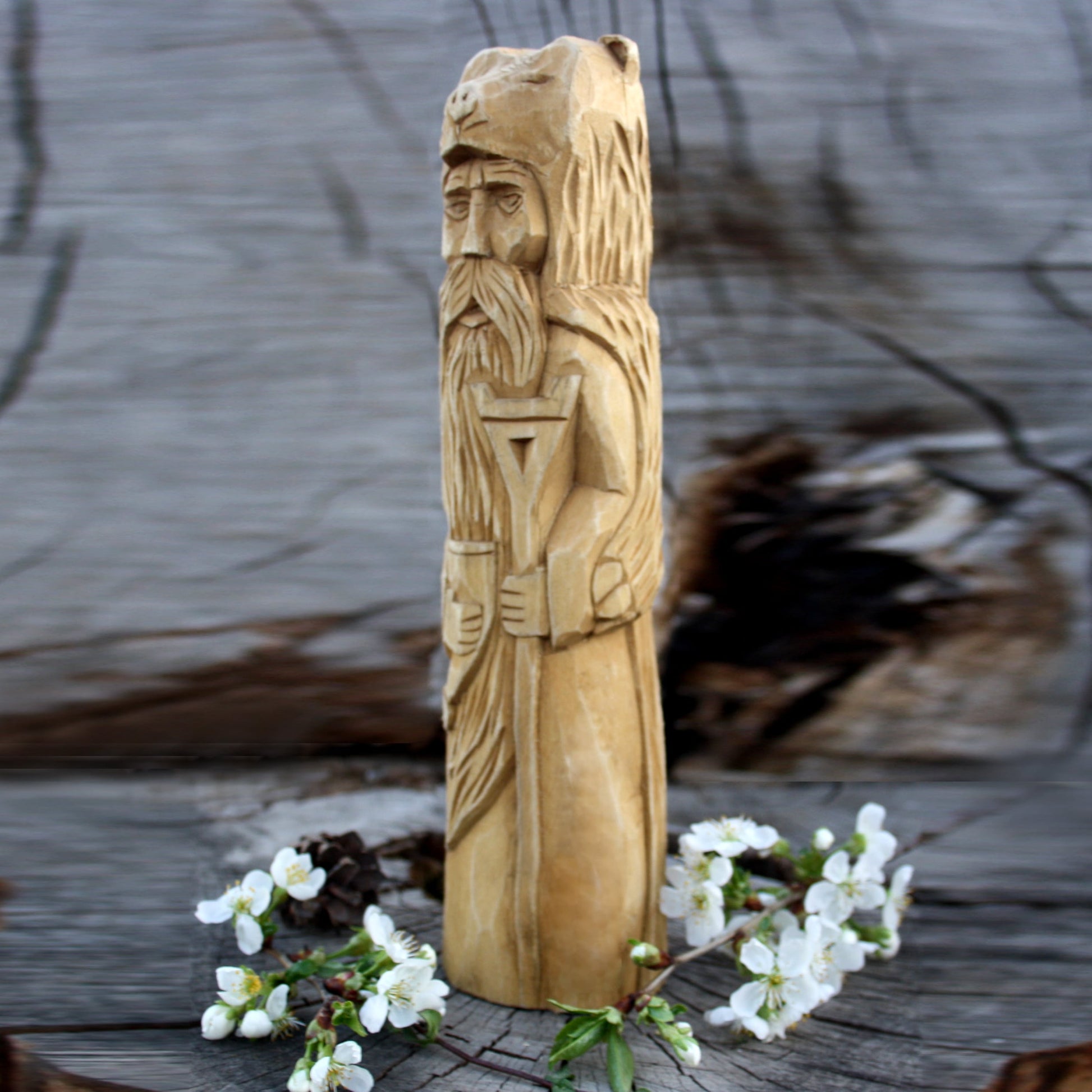 Left side of Veles Slavic God wooden statue handcrafted from linden wood