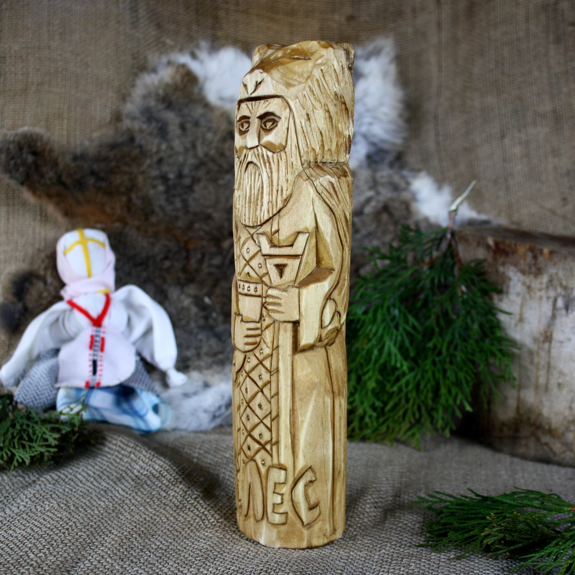 Left side of Veles Slavic God wooden statue handcrafted from linden wood