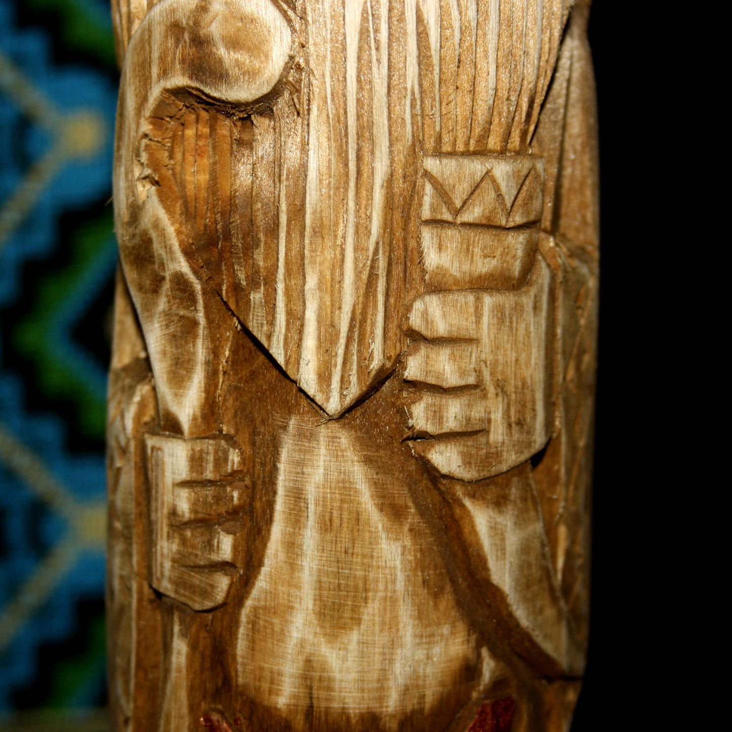 Close-up of natural wood grain on Veles Slavic God wooden idol