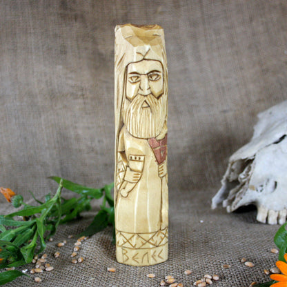 Front view of Veles Slavic wooden idol 18 cm hand carved from linden wood