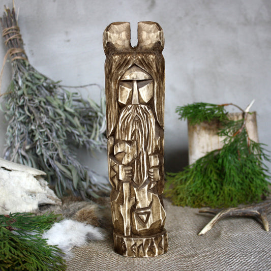 Front view of Veles Slavic wooden idol 25 cm with dark wood finish