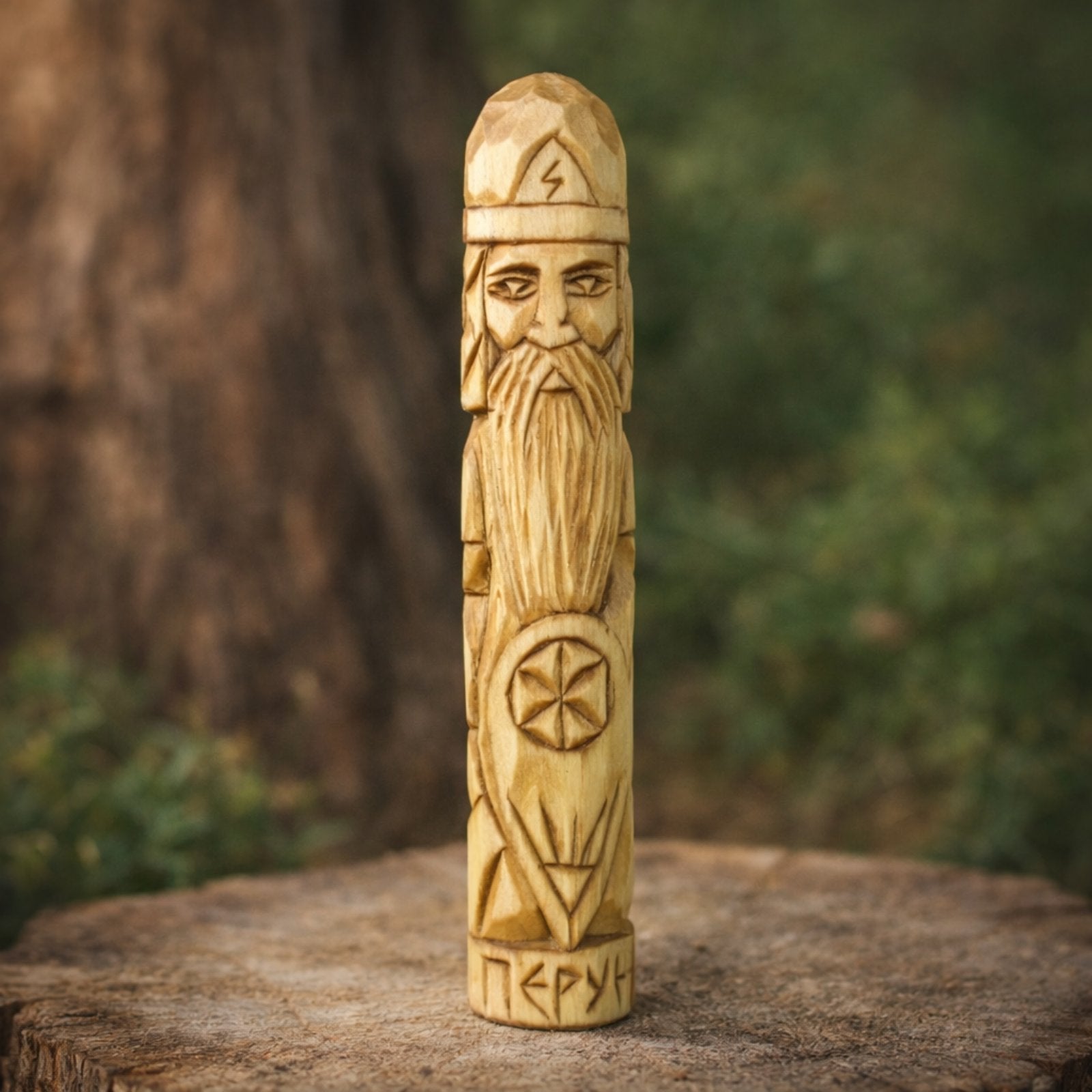 Slavic god Perun wooden statue hand carved linden wood on a natural background