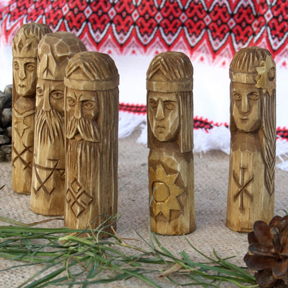 Set of five hand carved Slavic wooden idols 10 cm left side view