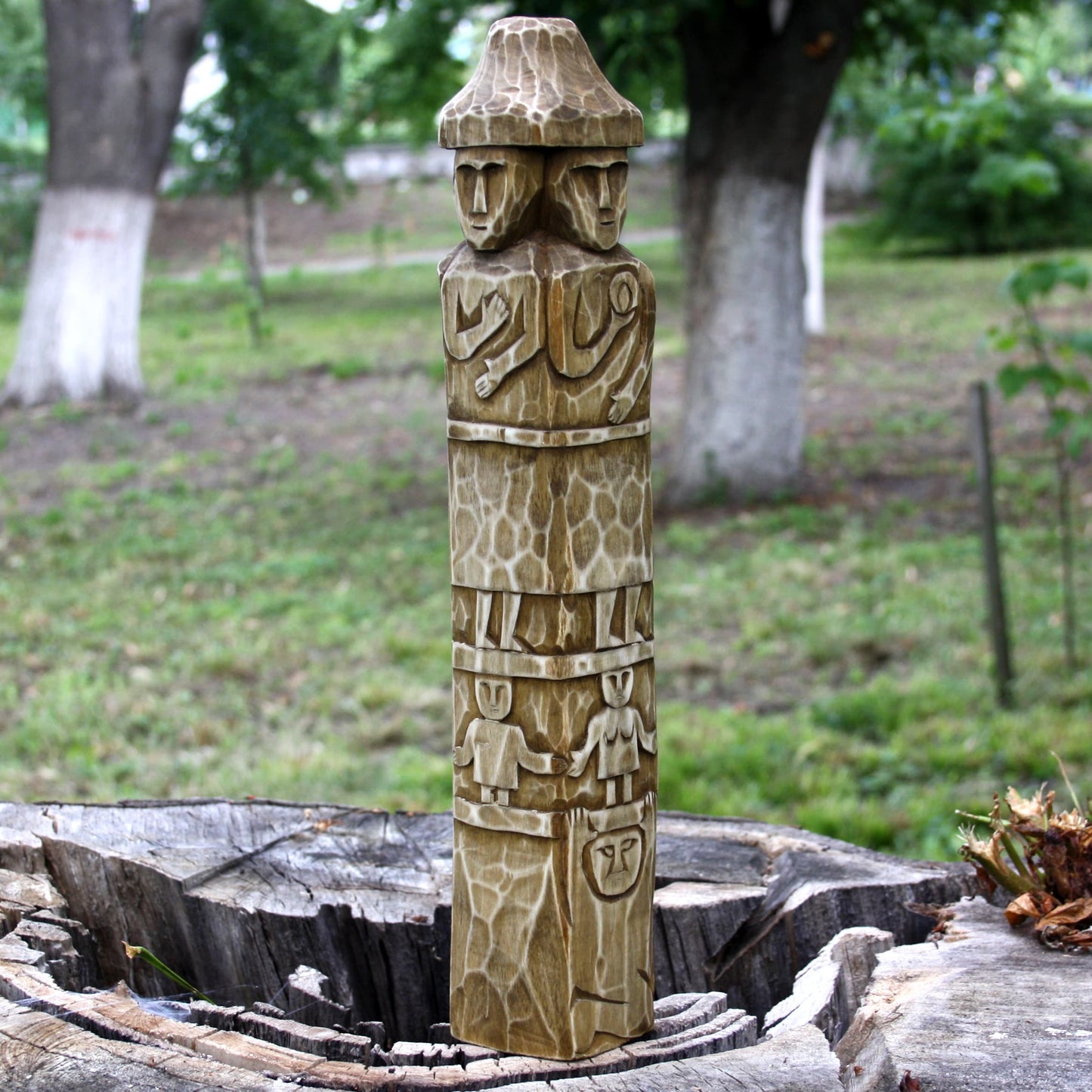 Left side part one of Zbruch Idol wooden replica handcrafted from linden wood