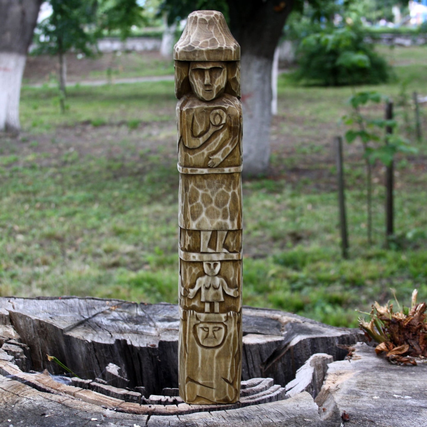 Left side part two of Zbruch Idol wooden replica handcrafted from linden 